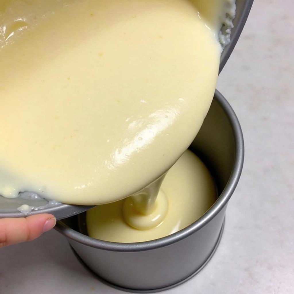 Angel food cake batter in a tube pan