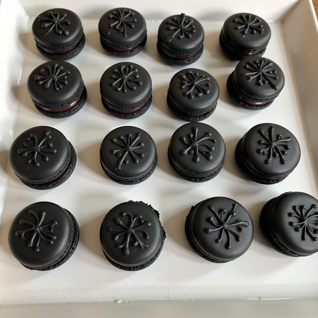 Beautifully Decorated Black Macarons