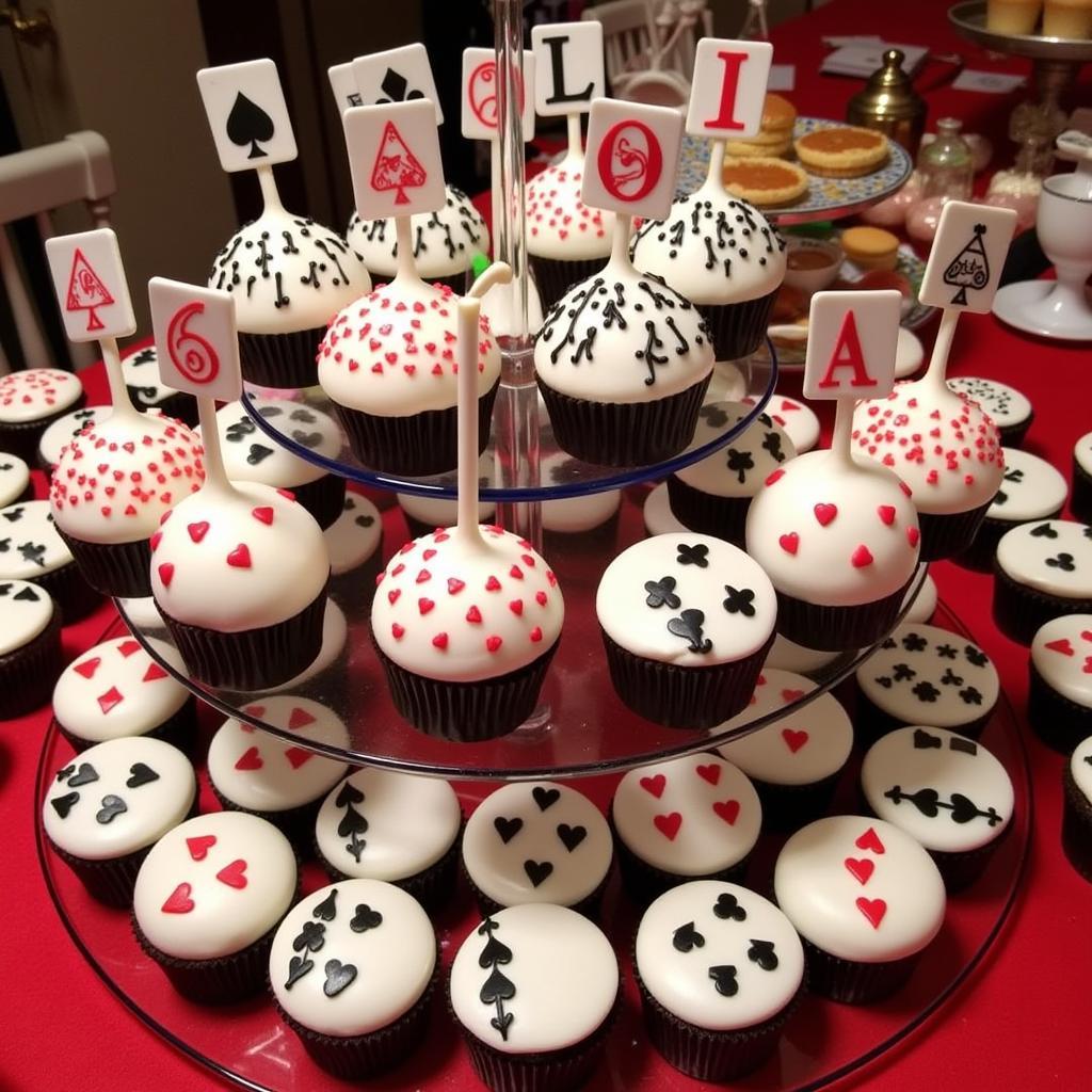  Casino themed cake pops and cupcakes decorated with playing card symbols