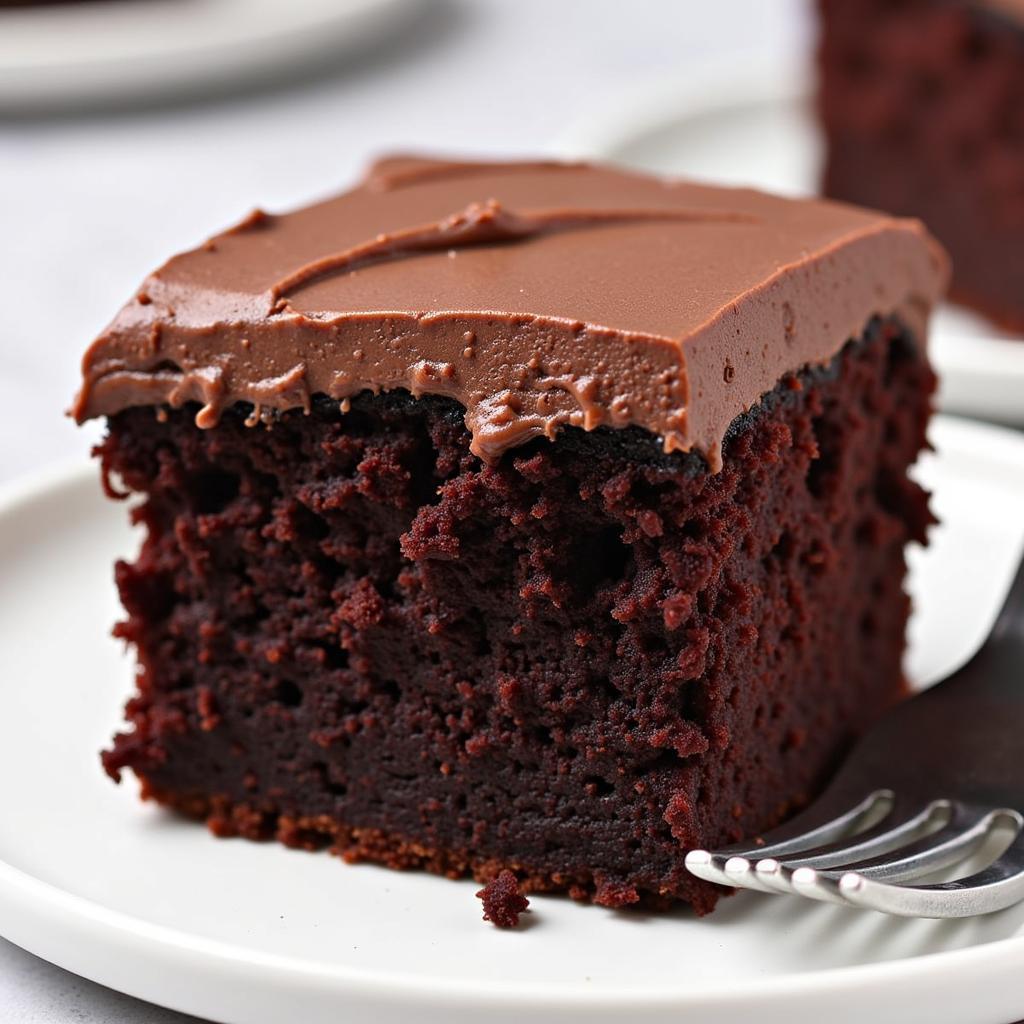 Delicious Slice of Devil's Food Cake with Chocolate Frosting