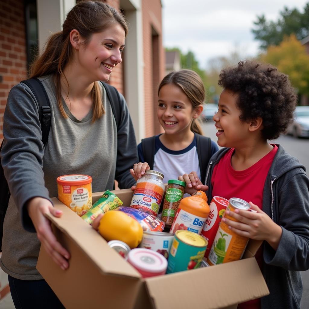 A smiling family stands at their doorstep, gratefully receiving a box of donated food items.