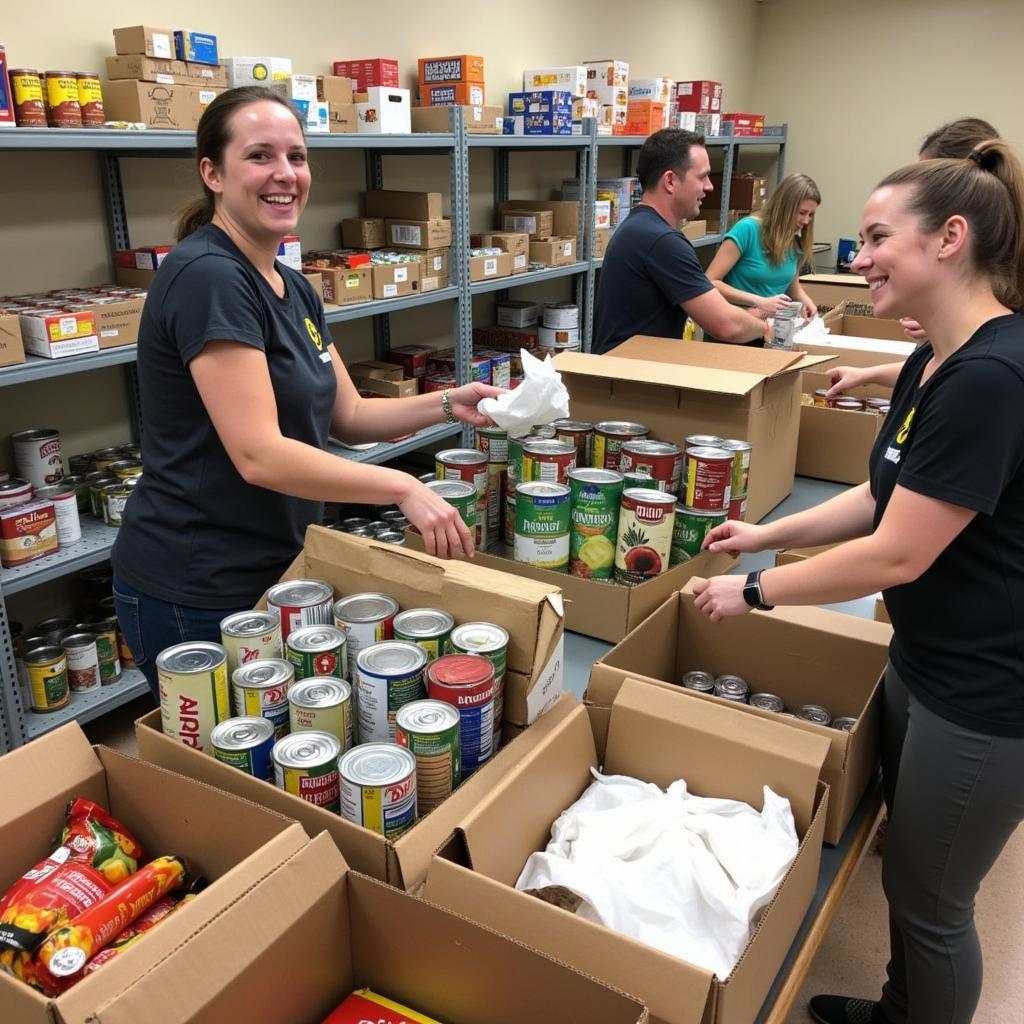 Volunteers sorting and packing food donations at Fellowship Missionary Baptist Church food pantry