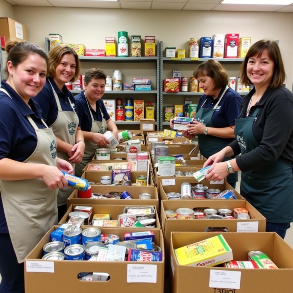 Volunteers sorting donations at Fitchburg food pantry