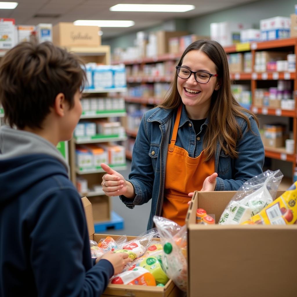 A friendly staff member helps a person choose items at a Hillsdale, MI, food pantry.