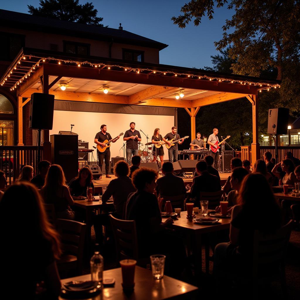 Outdoor stage with a live band performing at Millcreek Commons