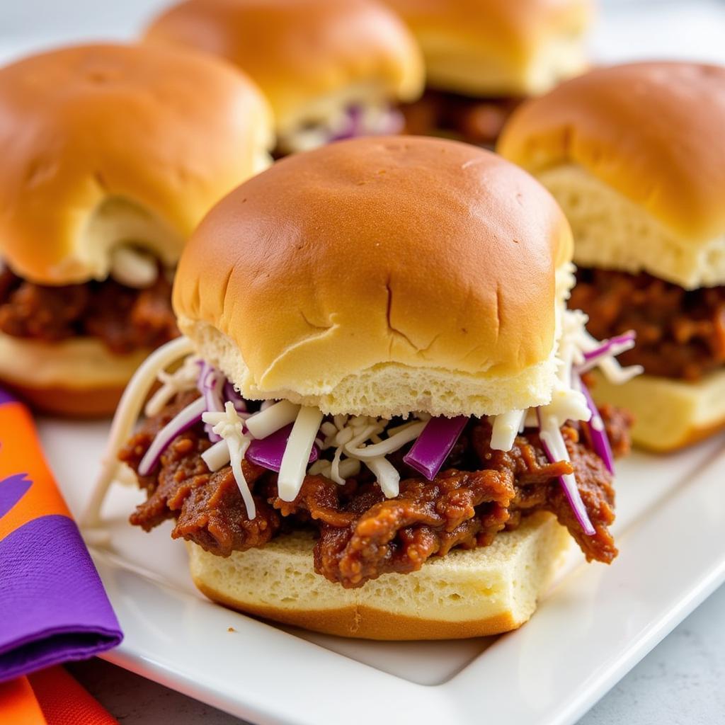 Slow Cooker Pulled Pork Sandwiches With Clemson Decorations