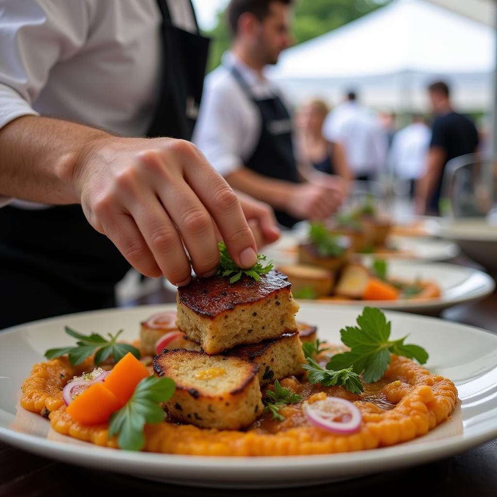 Chef preparing a dish at the Altamont Food and Wine Festival