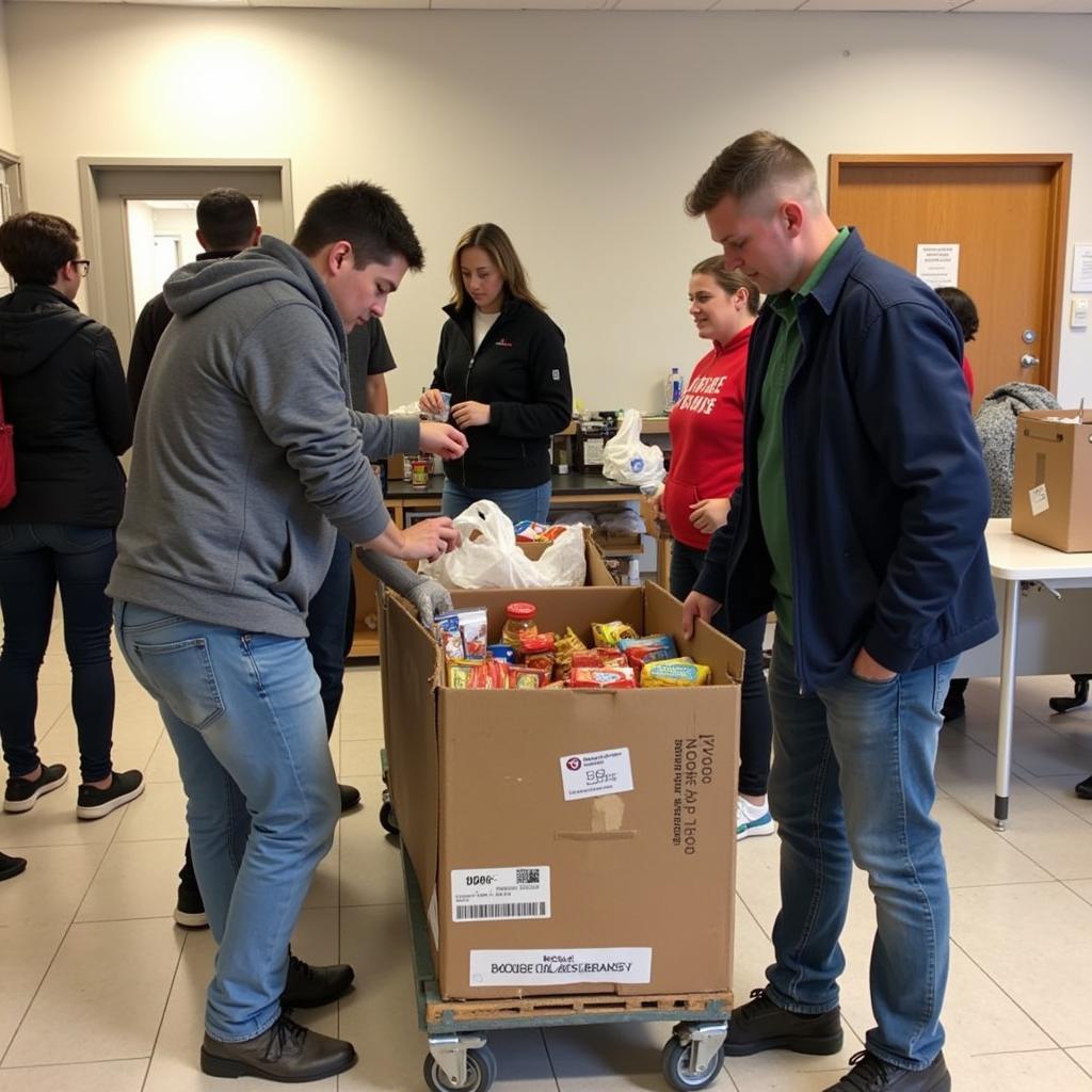 Community members donating food at the Asbury Food Pantry