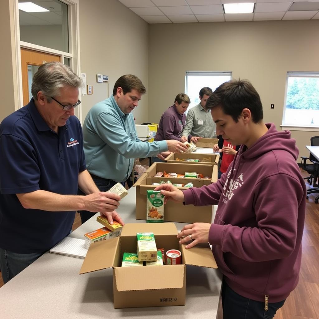 Volunteers packing food boxes at the Chisholm Food Shelf