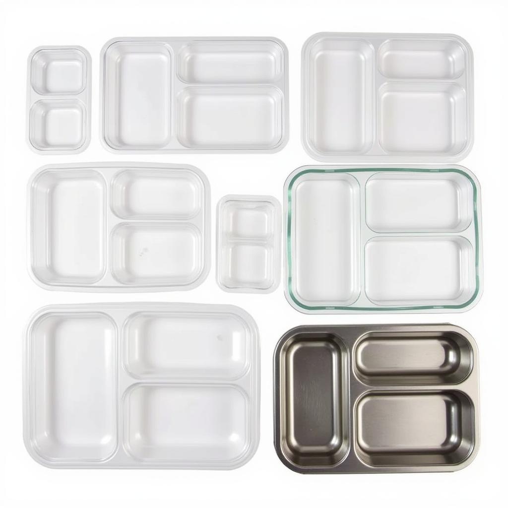 Variety of 3 compartment food storage containers.