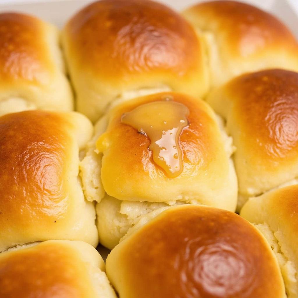 Food processor dinner rolls brushed with melted butter