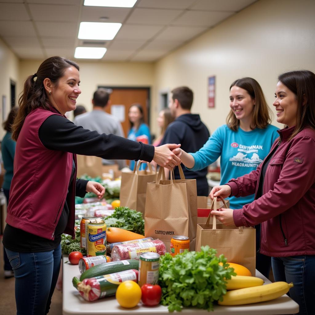 Volunteers distributing food at the Geary County Food Pantry