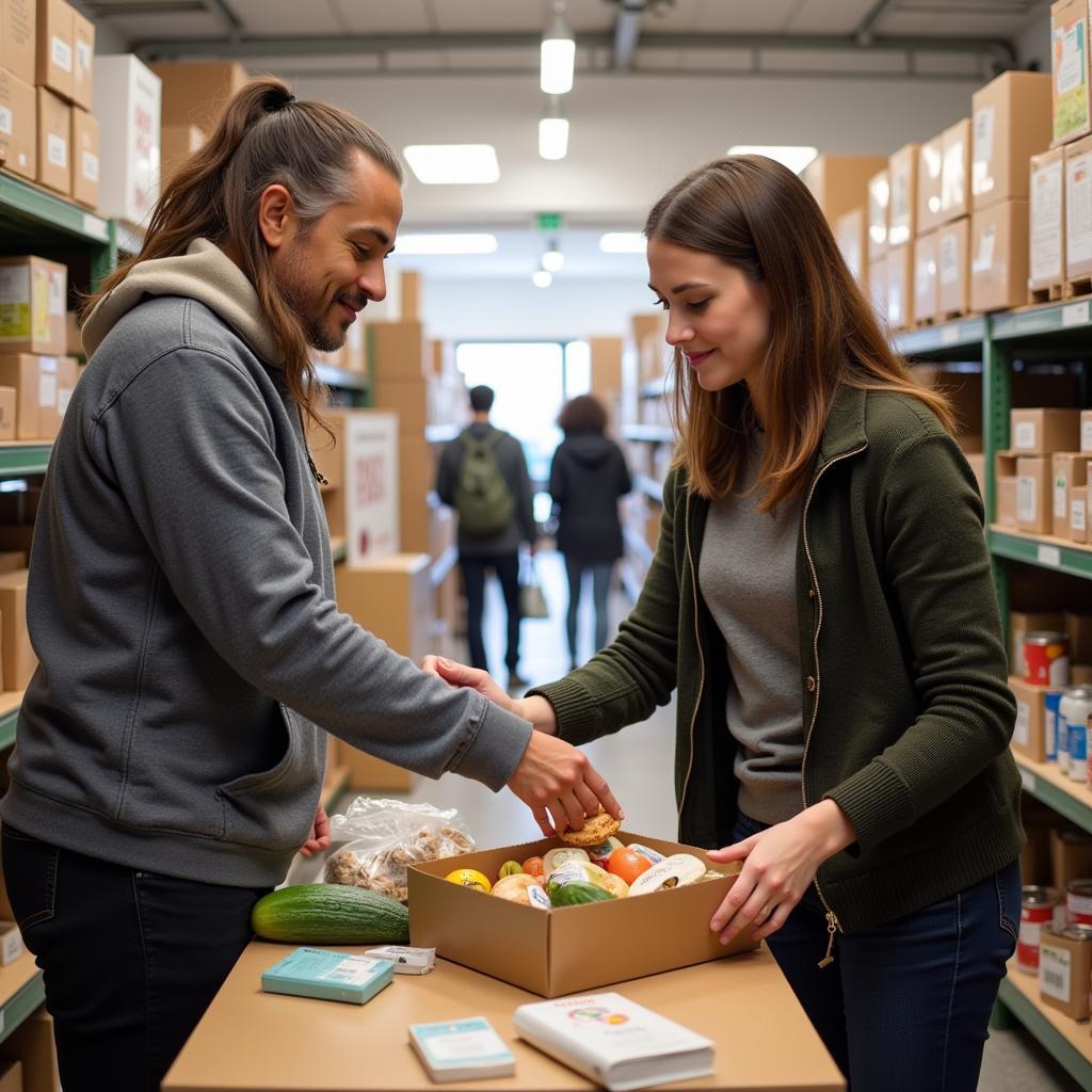 Kalamazoo Food Bank Volunteer Helping Client