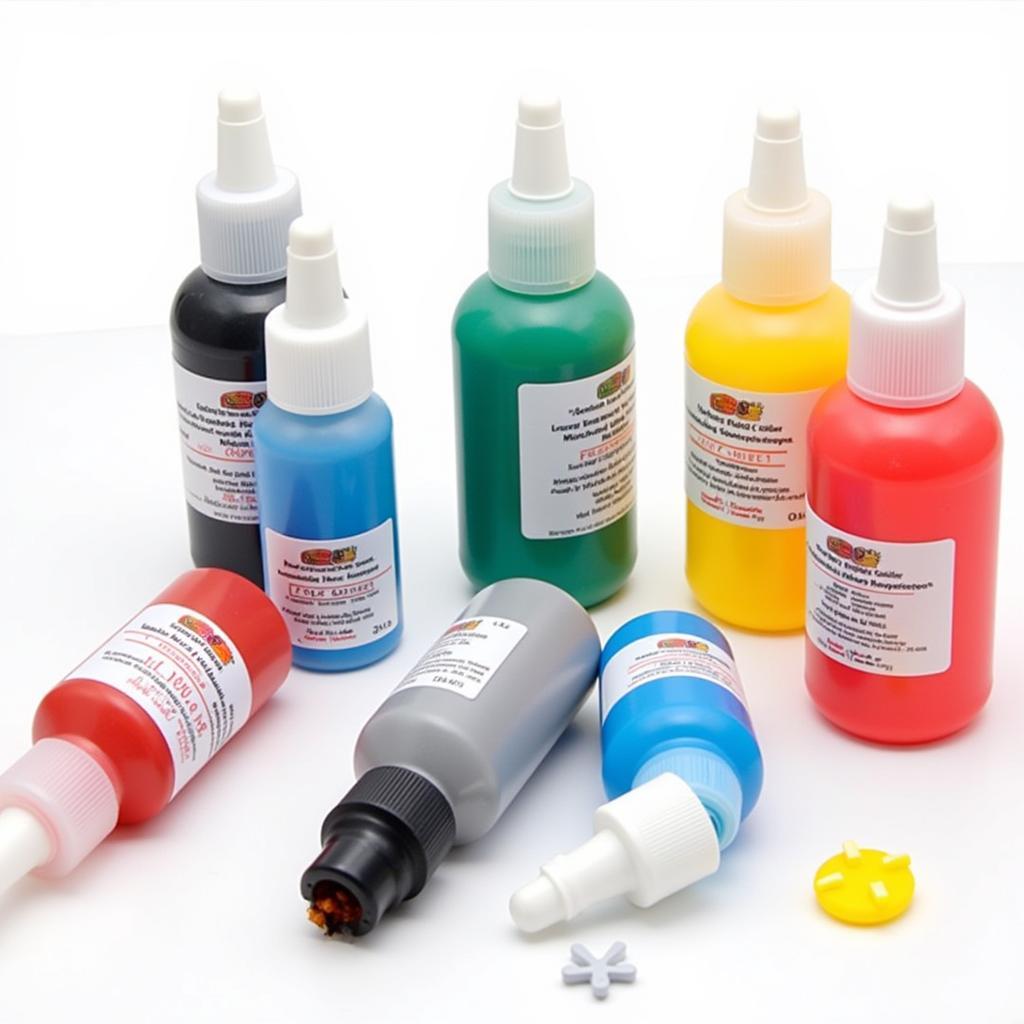 Various bottles of vibrant liquid gel food coloring