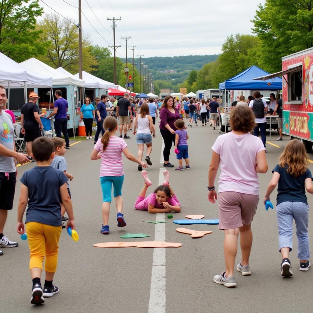 Families enjoying activities at the MB Food Truck Festival