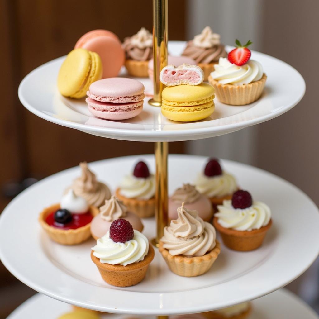 Miniature Desserts Presented Elegantly on a Tiered Stand