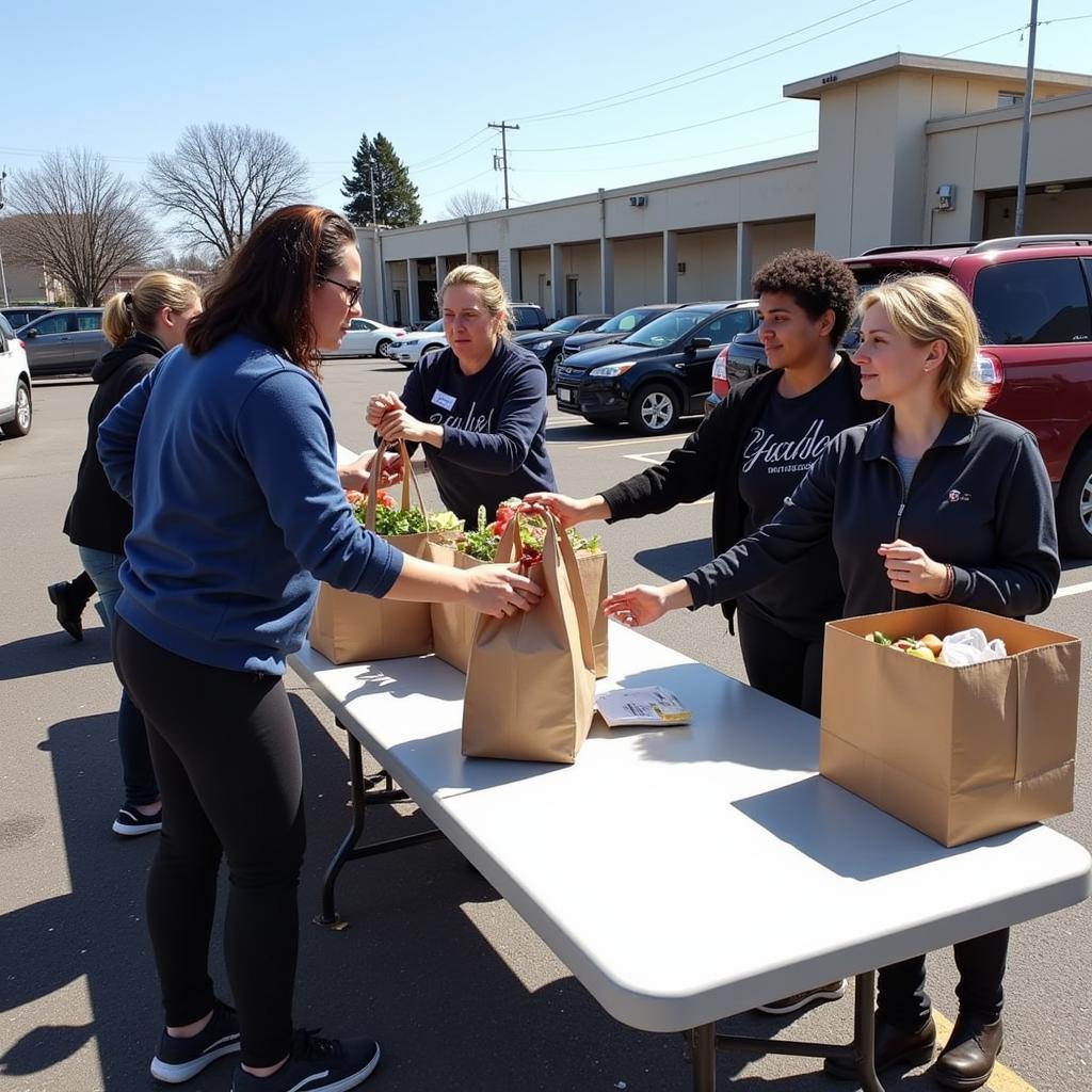 Volunteers distributing food at a mobile food pantry