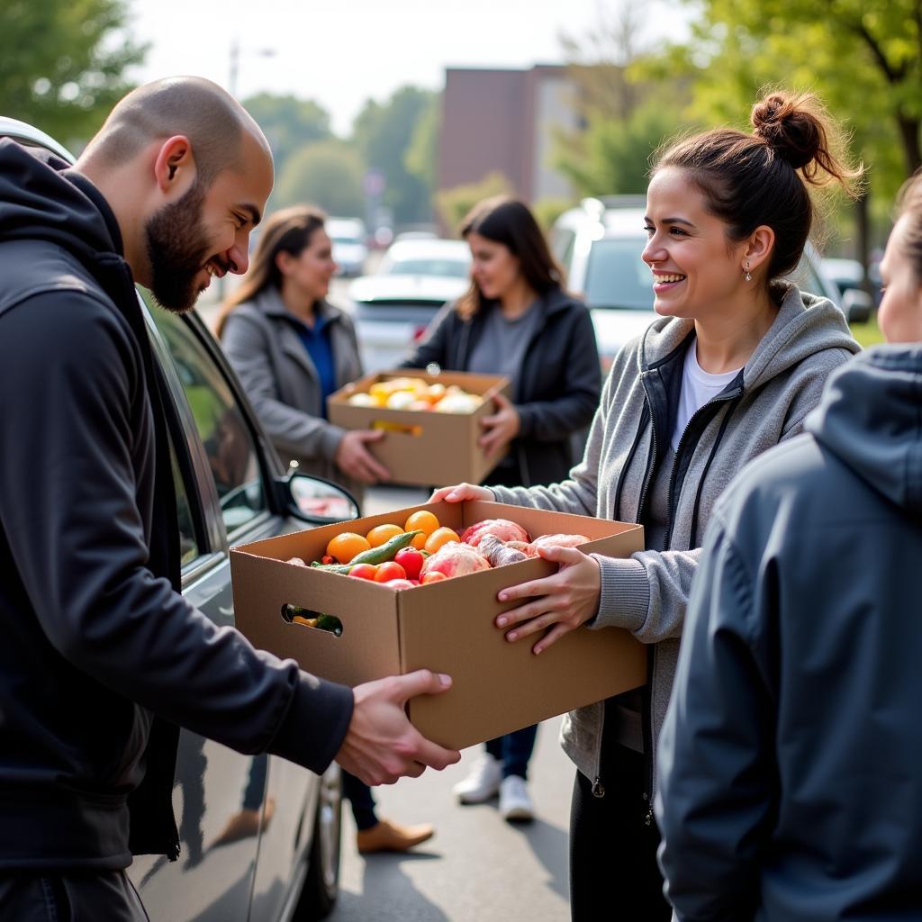 RGV Food Bank Staff Distributing Food to Families