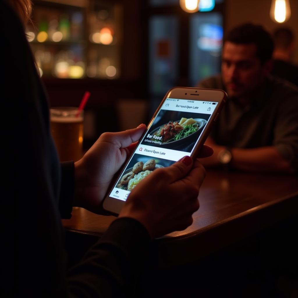 Person searching for "bar food open late" on their phone