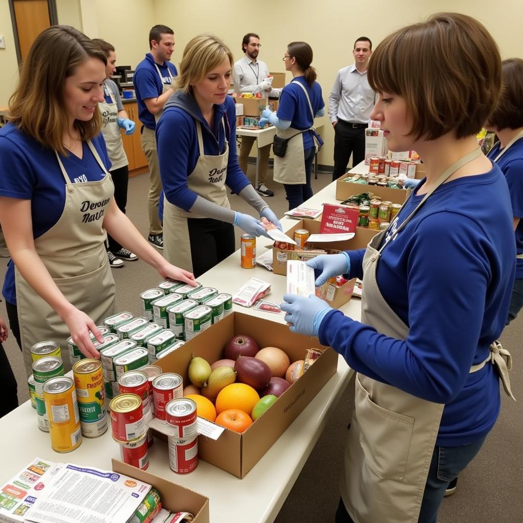 St. John Vianney Food Bank Volunteers Packing Boxes