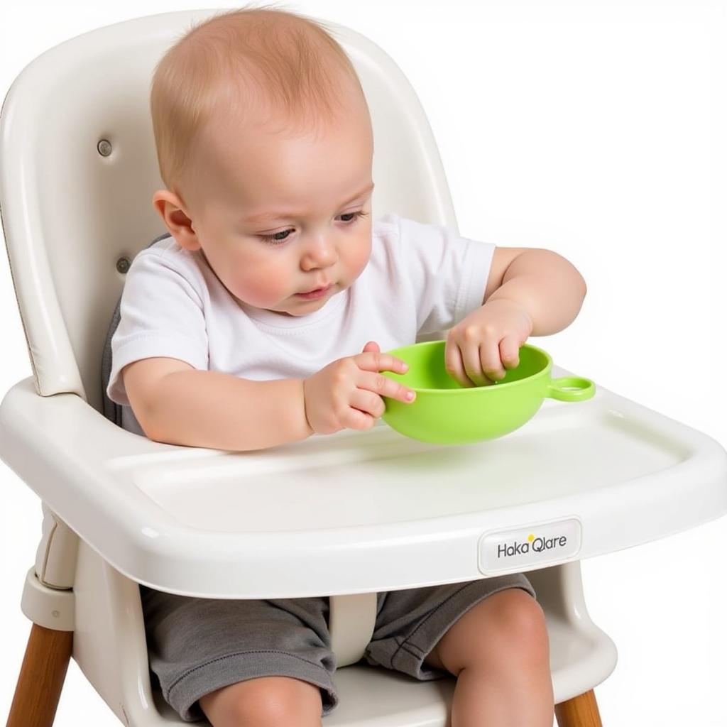 Baby Happily Using a Haakaa Food Feeder