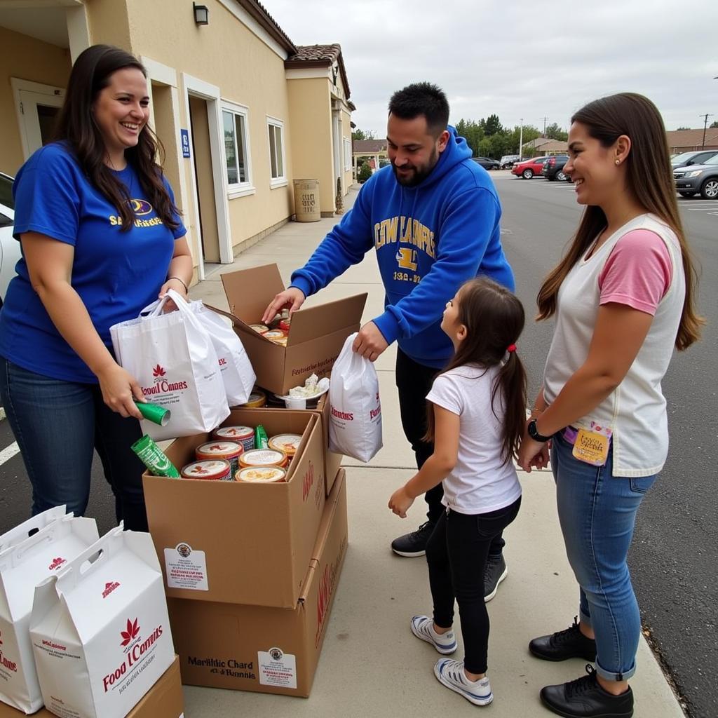 Community members donating food to Catholic Charities of Merced