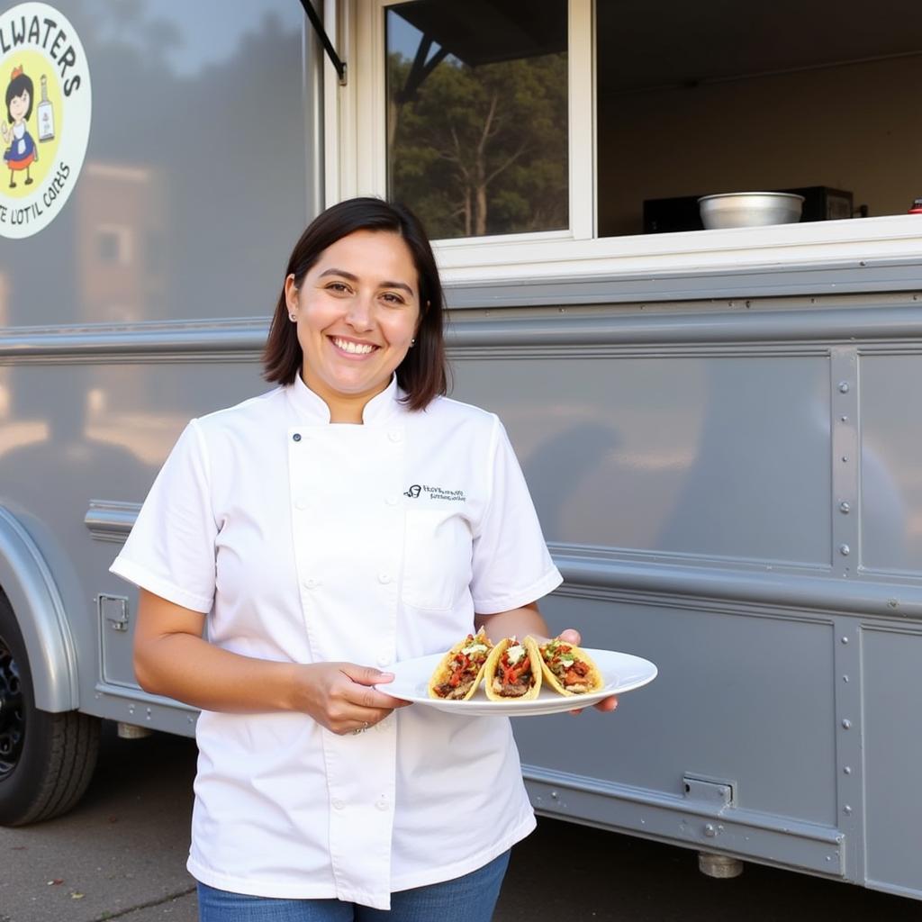 Head Chef Amelia Thompson posing in front of the Gigglewaters food truck, holding a plate of their signature Korean BBQ Tacos.