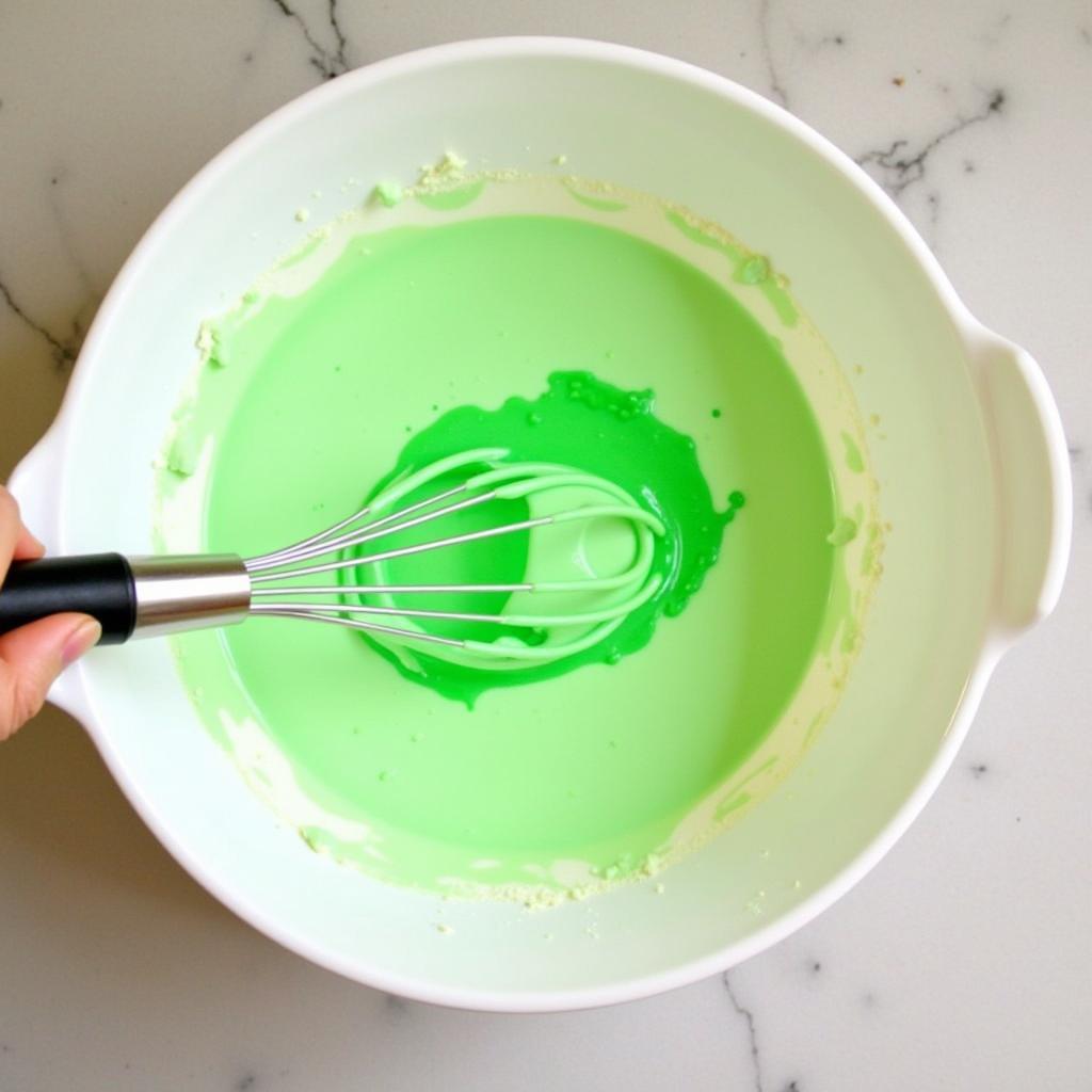 Mixing Neon Gel Food Colouring into Batter