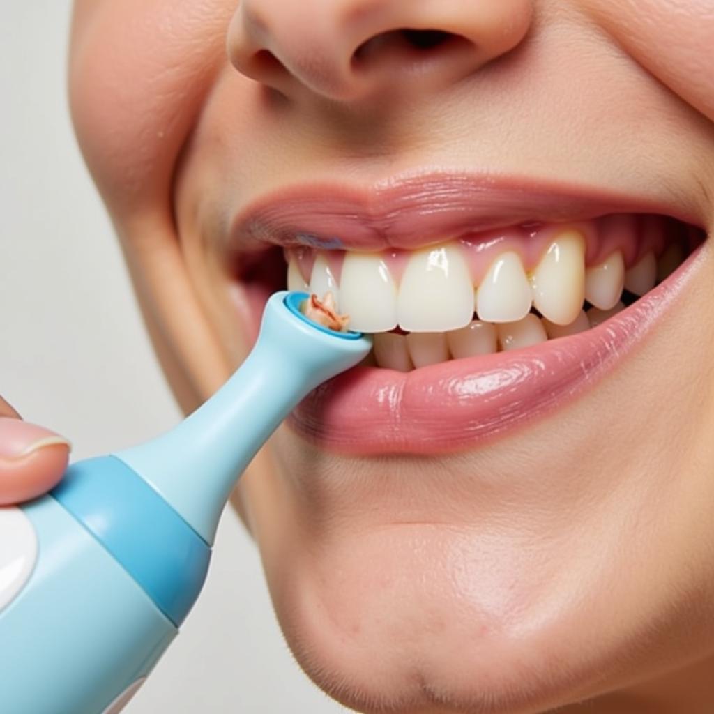 Using a Waterpik to remove food debris from braces