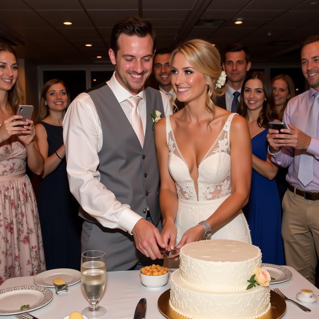 The bride and groom cutting a multi-tiered wedding cake at a Jewish wedding reception.