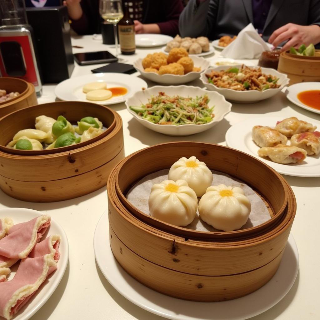 A colorful assortment of dim sum dishes on a table, ready to be enjoyed.